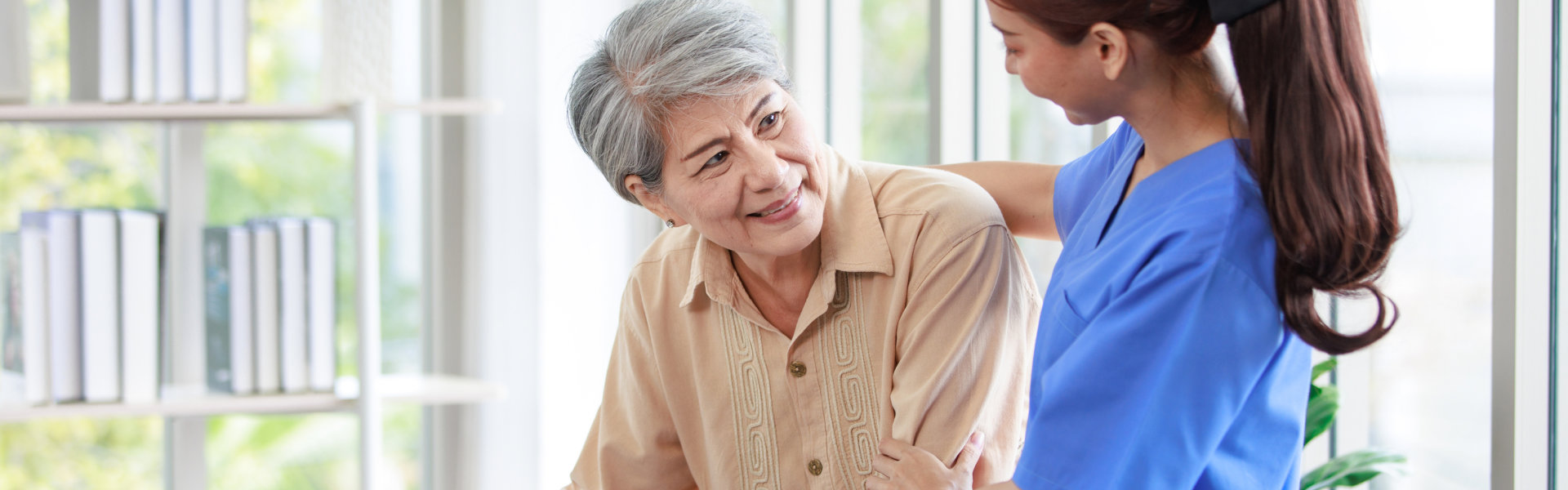 a caregiver taking care of an elder